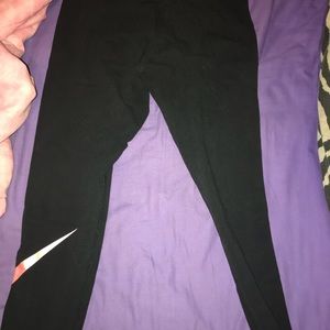 Black Nike Leggings with Pink Swoosh on Leg Size M